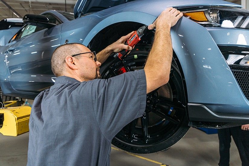 Mechanic fixing a vehicle