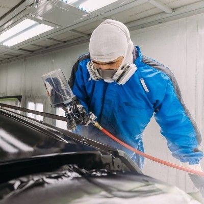 Mechanic Painting Car